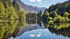 Glencoe Lochan near Glencoe village on a still day.